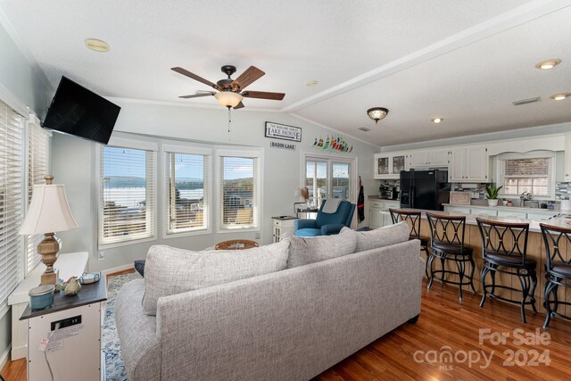 127 Lake View Dr, New London, NC 28127 - living room featuring ceiling fan, lofted ceiling, wood finished floors, recessed lighting, and baseboards