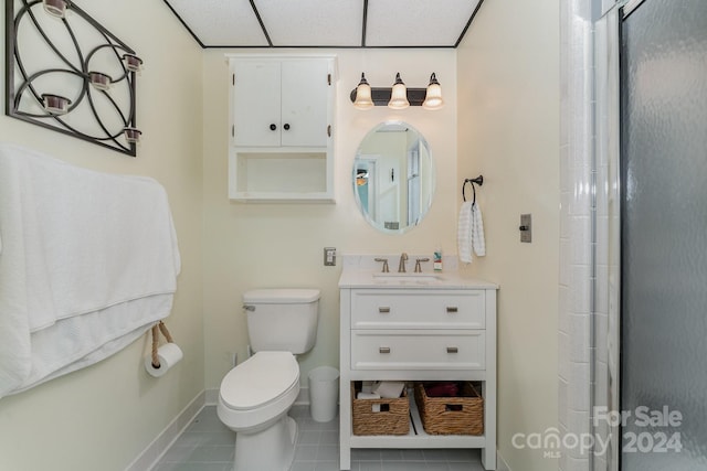 127 Lake View Dr, New London, NC 28127 - bathroom with tile patterned flooring, toilet, a stall shower, and vanity
