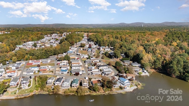 127 Lake View Dr, New London, NC 28127 - aerial view of property and surrounding area with a forest and a nearby body of water