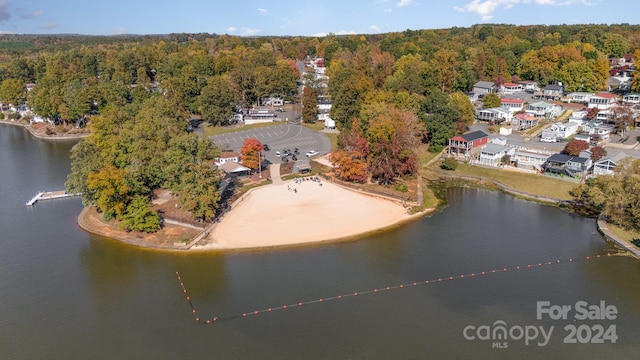 127 Lake View Dr, New London, NC 28127 - aerial view of property's location featuring a heavily wooded area and a large body of water
