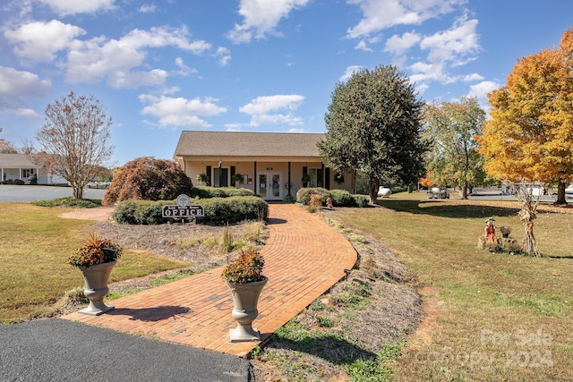 127 Lake View Dr, New London, NC 28127 - ranch-style home featuring a front yard and french doors
