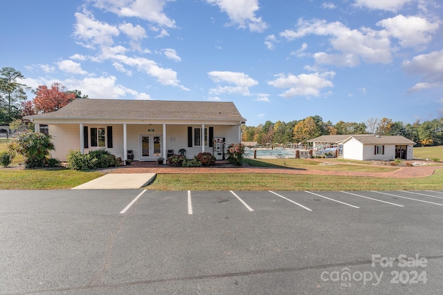 127 Lake View Dr, New London, NC 28127 - view of front of property featuring uncovered parking, french doors, and a porch