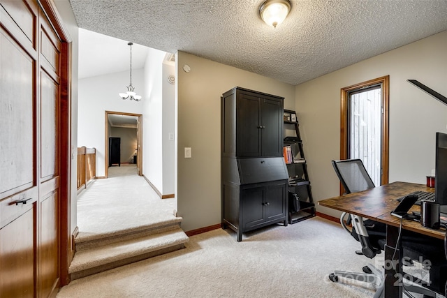 office area with light carpet, a textured ceiling, and lofted ceiling