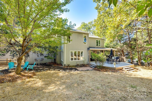 rear view of property with a deck