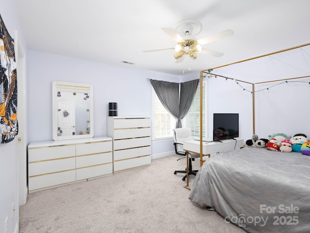 carpeted bedroom with ceiling fan