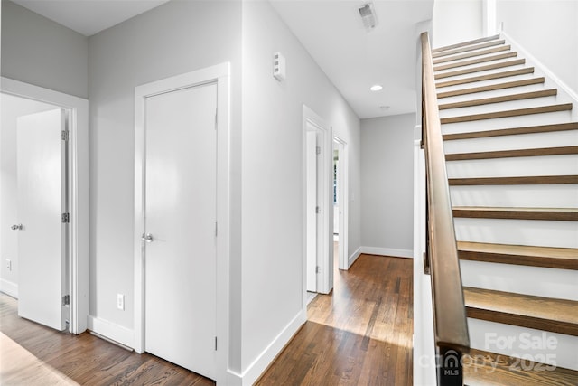 entrance foyer with dark hardwood / wood-style floors