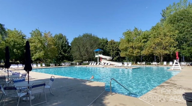 view of pool featuring a patio