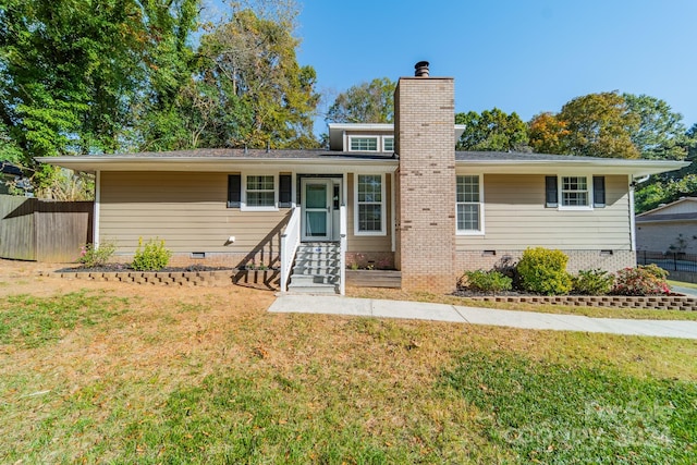 view of front facade with a front yard