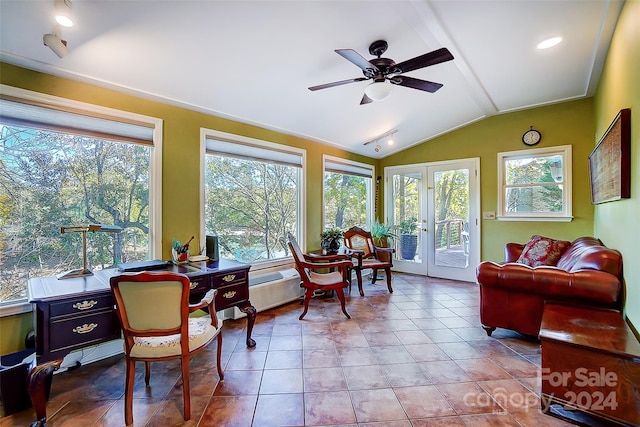 sunroom / solarium featuring french doors, vaulted ceiling with beams, and ceiling fan