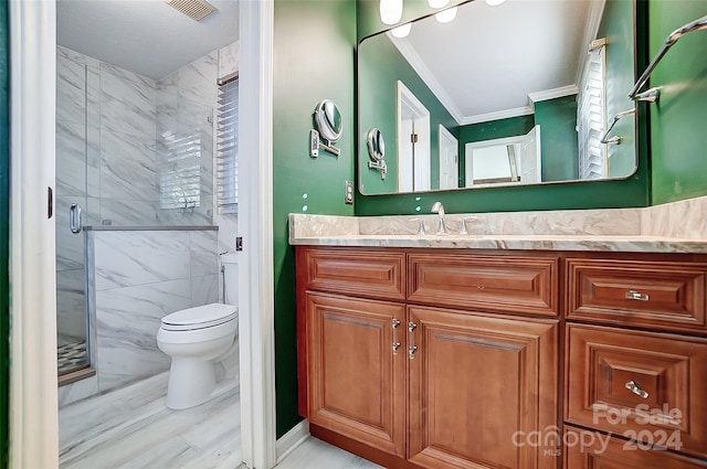 bathroom with tile walls, ornamental molding, vanity, an enclosed shower, and toilet