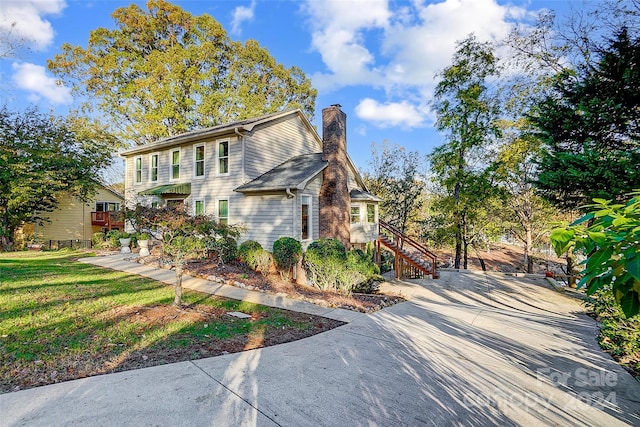 exterior space with a front yard