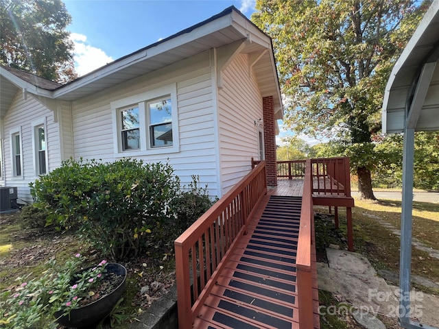 view of home's exterior featuring a deck