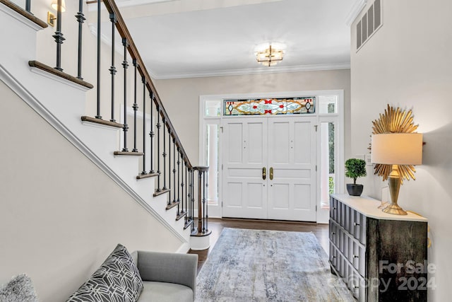 4141 Shattalon Dr, Winston Salem, NC 27106 - foyer featuring stairs, healthy amount of natural light, wood finished floors, and ornamental molding