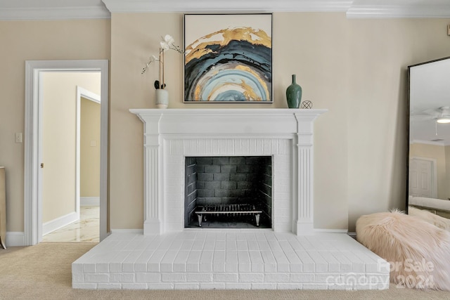 room details featuring a fireplace, carpet, and crown molding