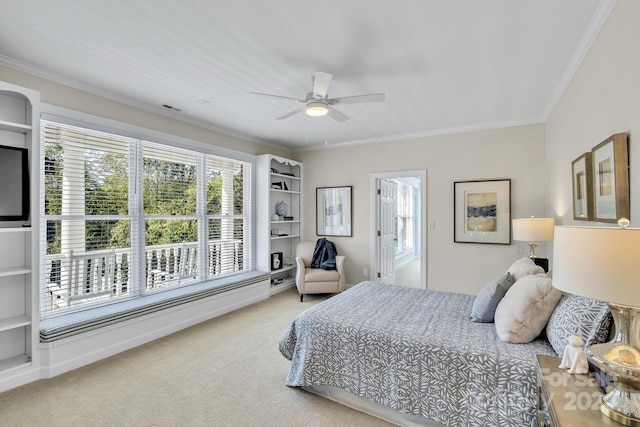 bedroom featuring carpet flooring, ceiling fan, and crown molding