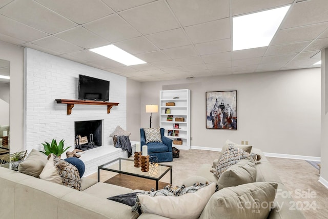 4141 Shattalon Dr, Winston Salem, NC 27106 - carpeted living area featuring a brick fireplace and a drop ceiling