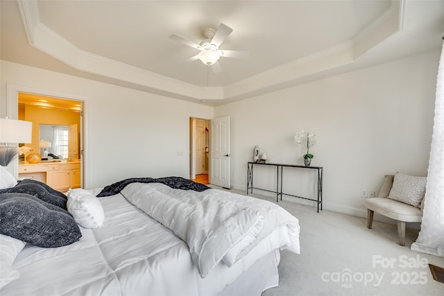 bedroom featuring light carpet, a ceiling fan, baseboards, a tray ceiling, and crown molding