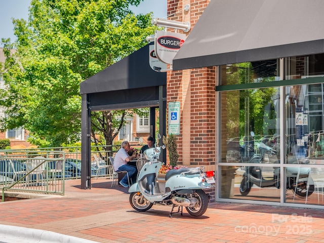 exterior space featuring brick siding