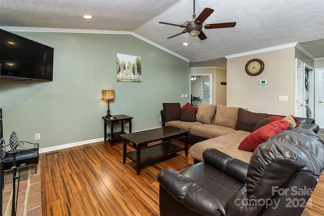 living room featuring wood-type flooring, crown molding, a textured ceiling, lofted ceiling, and ceiling fan