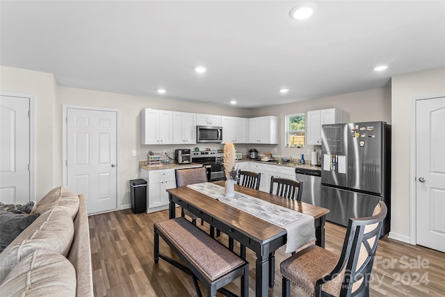 dining room featuring dark hardwood / wood-style flooring