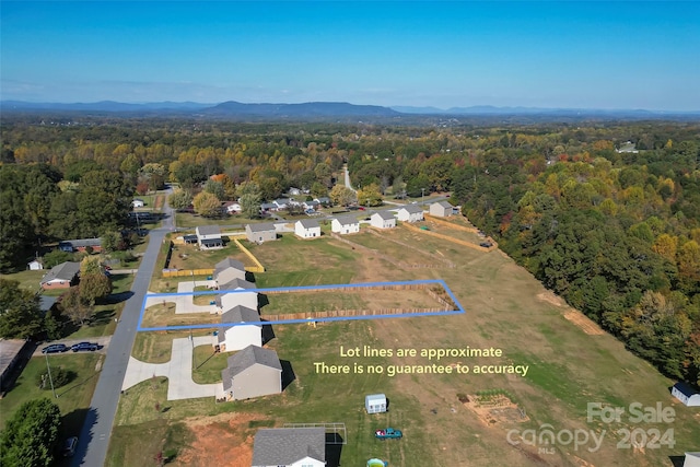 bird's eye view with a mountain view