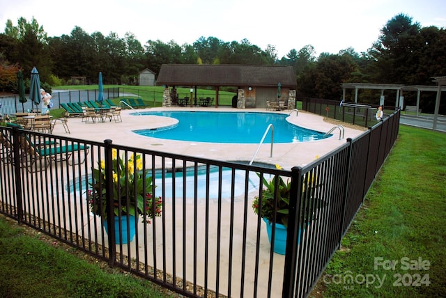 view of pool with a patio area