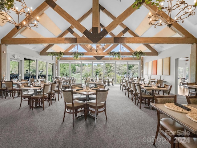 carpeted dining space with an inviting chandelier, high vaulted ceiling, and a healthy amount of sunlight