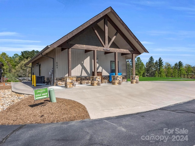 view of front of property with cooling unit