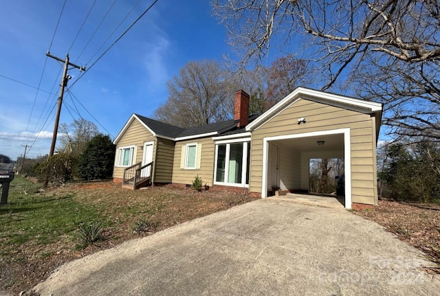 view of front of house with a carport