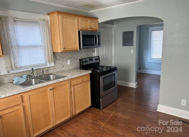 kitchen featuring sink, crown molding, electric panel, appliances with stainless steel finishes, and dark hardwood / wood-style flooring