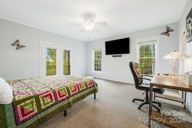 carpeted bedroom featuring french doors, ceiling fan, multiple windows, and access to exterior