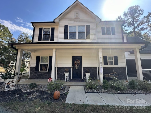 view of front of house featuring covered porch