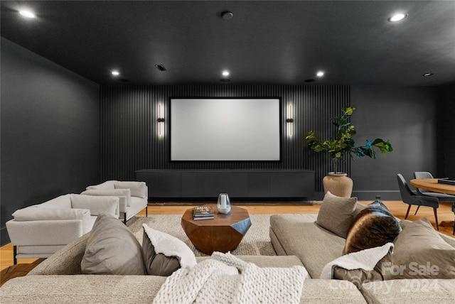 home theater featuring light hardwood / wood-style floors