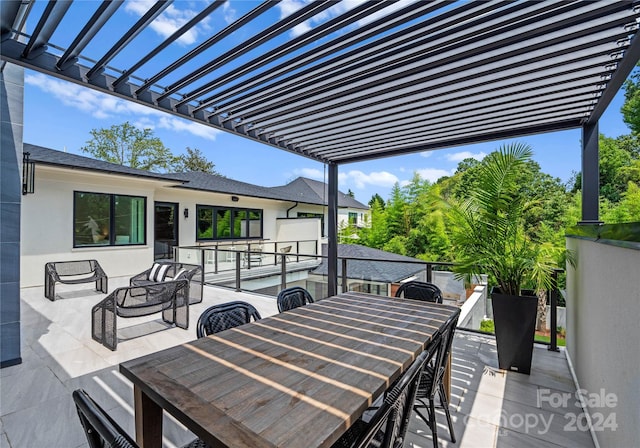 view of patio featuring a pergola