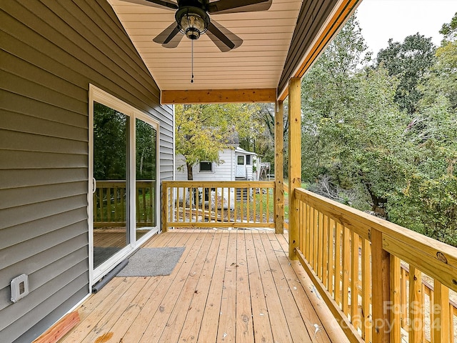 wooden terrace with ceiling fan