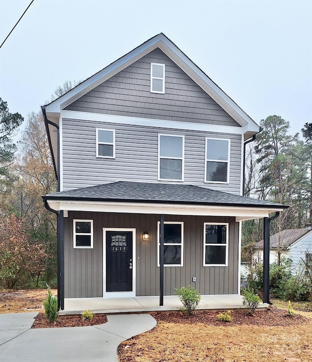 view of property with covered porch