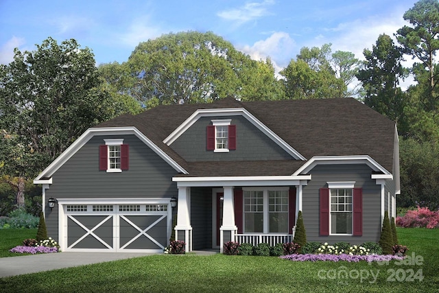 view of front of property with a front lawn and a garage