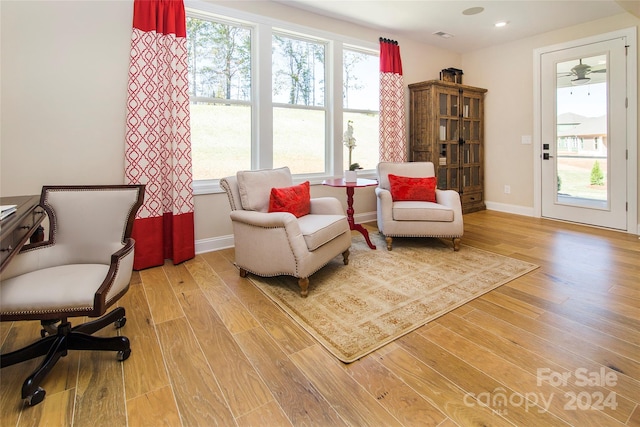 sitting room featuring light wood-type flooring