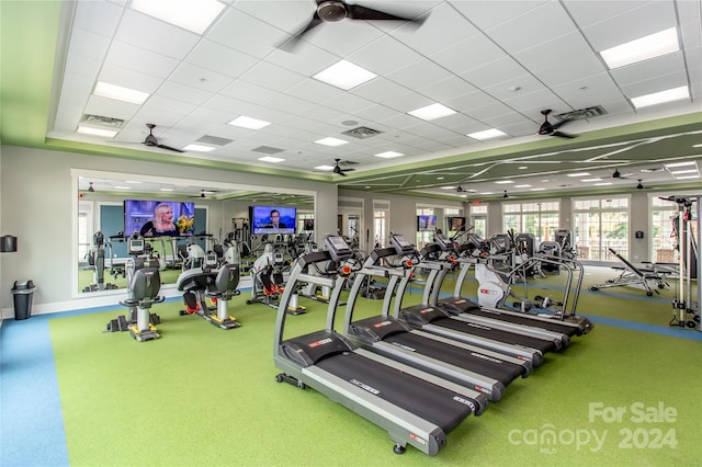 exercise room featuring a paneled ceiling