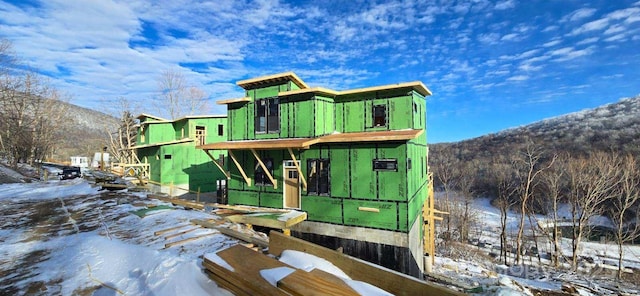 exterior space featuring a mountain view