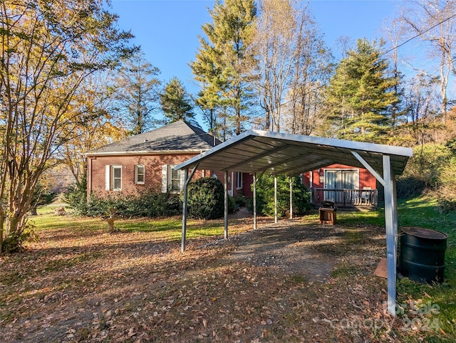 view of parking / parking lot with a carport