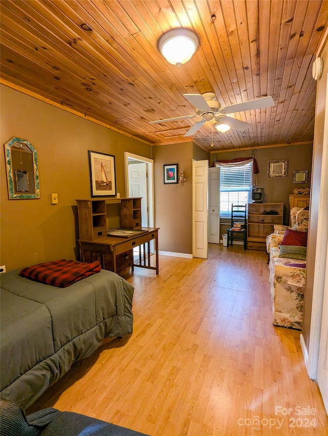 bedroom featuring crown molding, ceiling fan, light hardwood / wood-style floors, and wooden ceiling