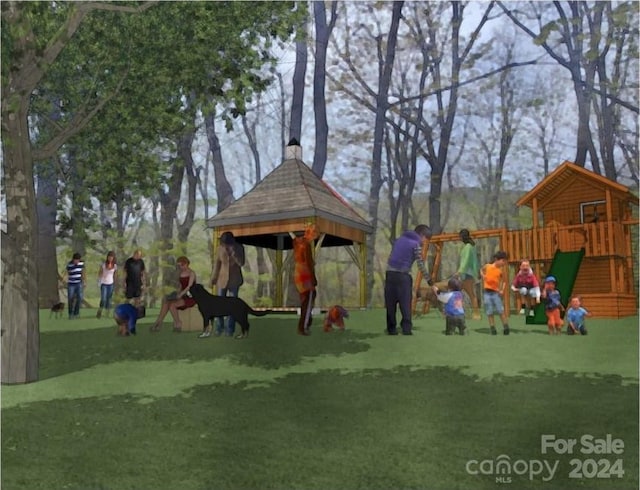 exterior space featuring a gazebo, a playground, and a lawn