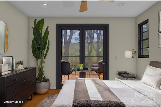 bedroom with light wood-type flooring and ceiling fan