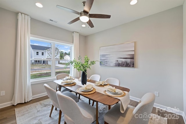 dining room featuring recessed lighting, wood finished floors, visible vents, baseboards, and ceiling fan