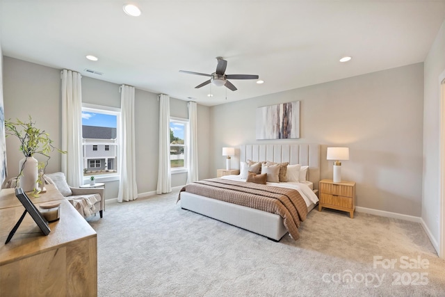 carpeted bedroom featuring recessed lighting, visible vents, baseboards, and ceiling fan