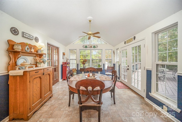 sunroom featuring vaulted ceiling, ceiling fan, and french doors