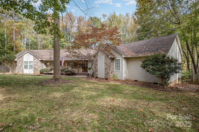 ranch-style home with a porch and a front lawn