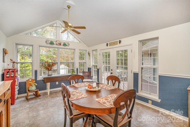 dining space featuring lofted ceiling, french doors, and ceiling fan