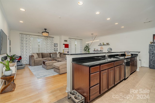 kitchen with sink, light wood-type flooring, stainless steel dishwasher, crown molding, and a kitchen island with sink